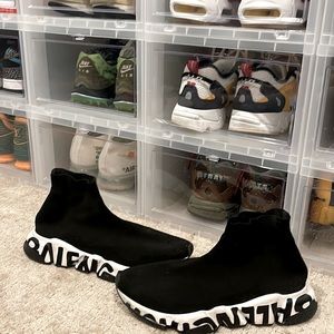 These stylish knit sneakers feature a sock-like body and logo print chunky sole